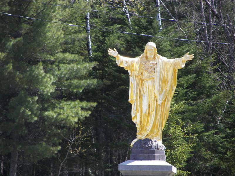 Statue outside large church in Jackman, Maine (#1244)