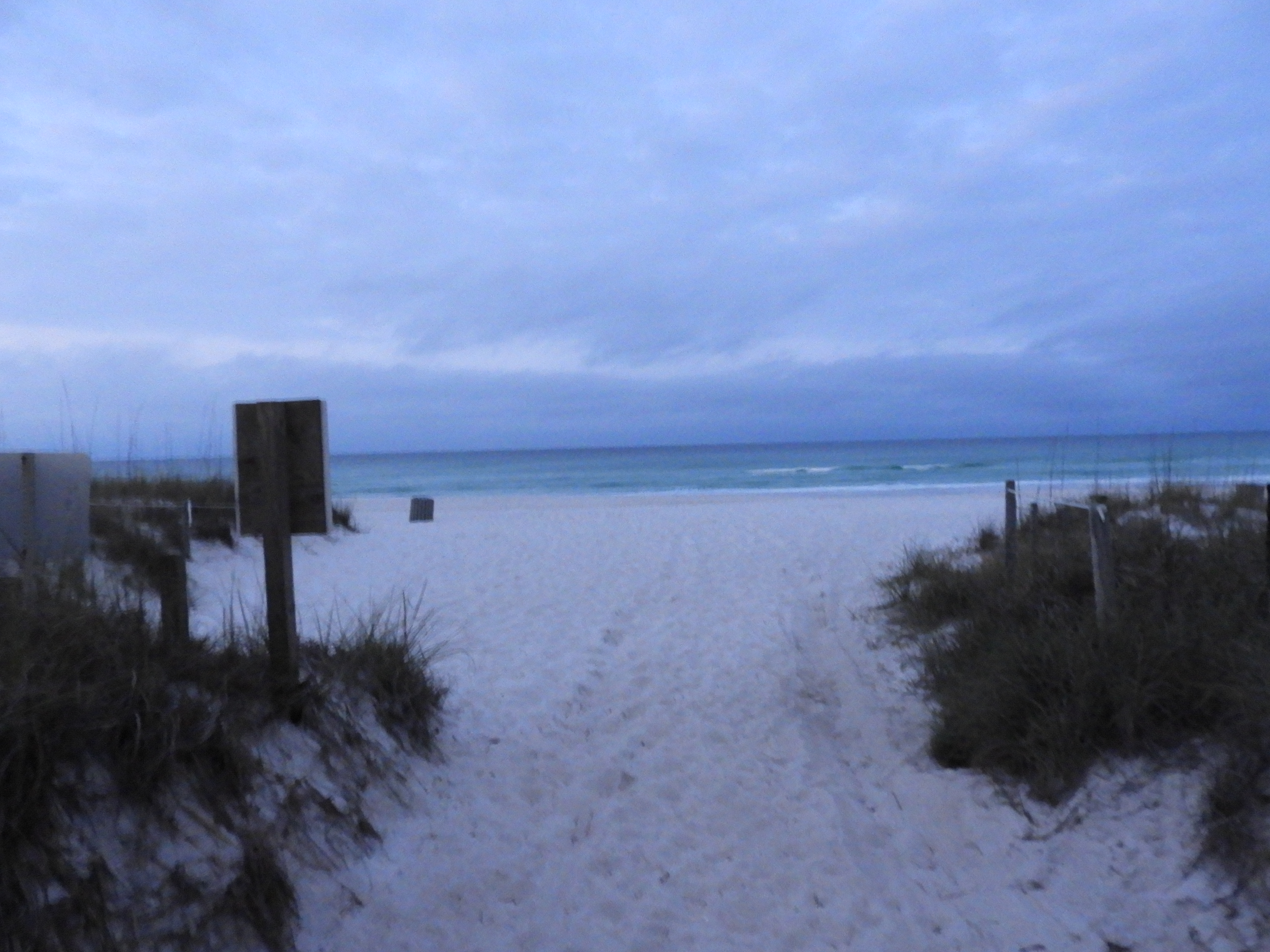 Pre-sunrise cloudy morning on the beach at Panama City Florida