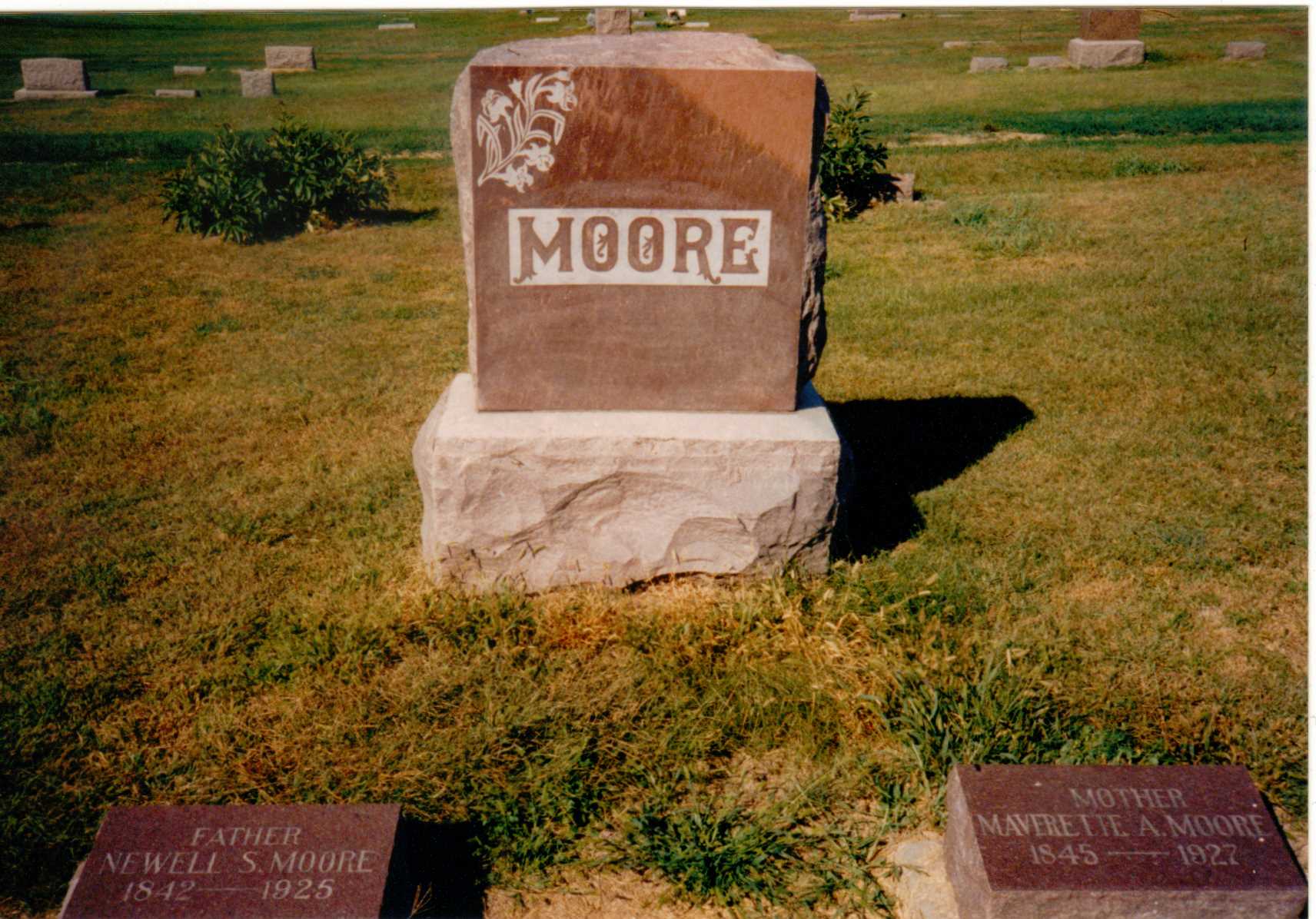 Tombstones of Newell Moore and Maverette Miller in Riverside Cemetery