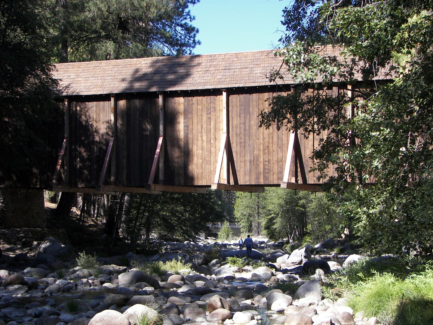 Walking along a rocky stream in Yosemite National Park  2 of 18 (#0857)