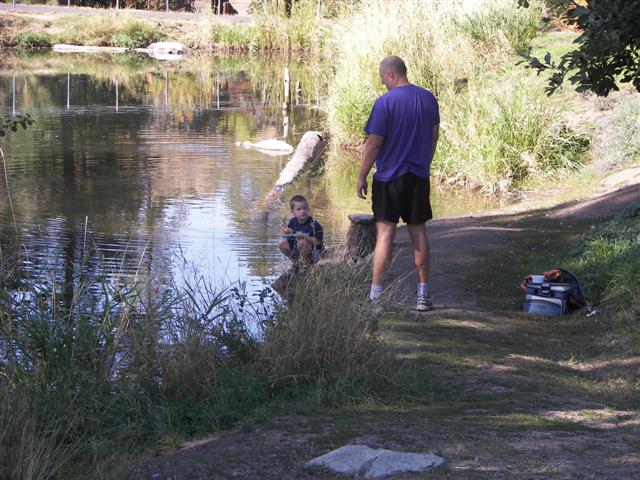 Falls Park in Post Falls, ID, dad teaching son to fish #13 of 13 (#2492)