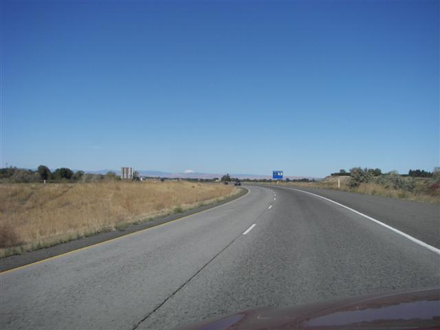 Snow capped Mt. Rainier in the distance from south of Yakima WA #1 of 2 (#3569)