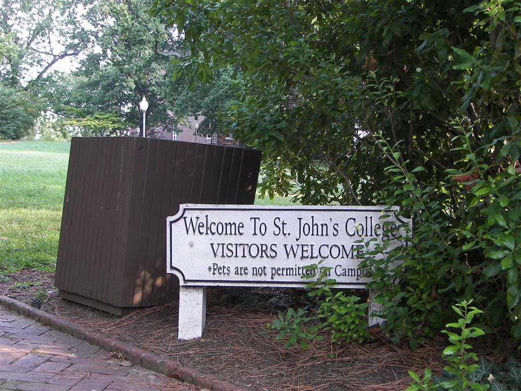 Near the state capitol building is a college that welcomes people but not their pets (#2125)