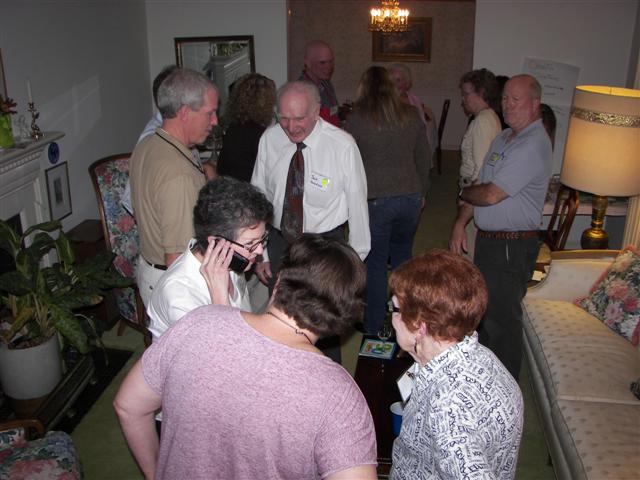 Lelie Abraham and Teresa Rowe and Pat Wilson talking to Roy Deaton (in New Orleans) the brother of Pat, Jack Knudsen in background ( 13 of 33) (#2820)