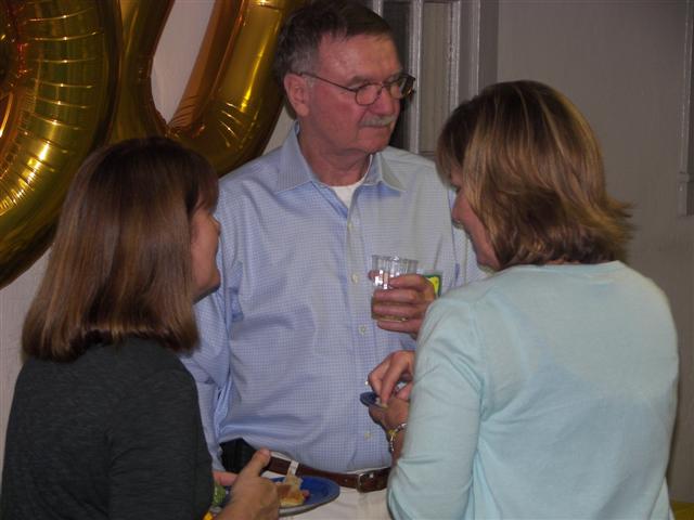 Mike Knudsen talking with guests at the birthday party of his father ( 32 of 44) (#2907)