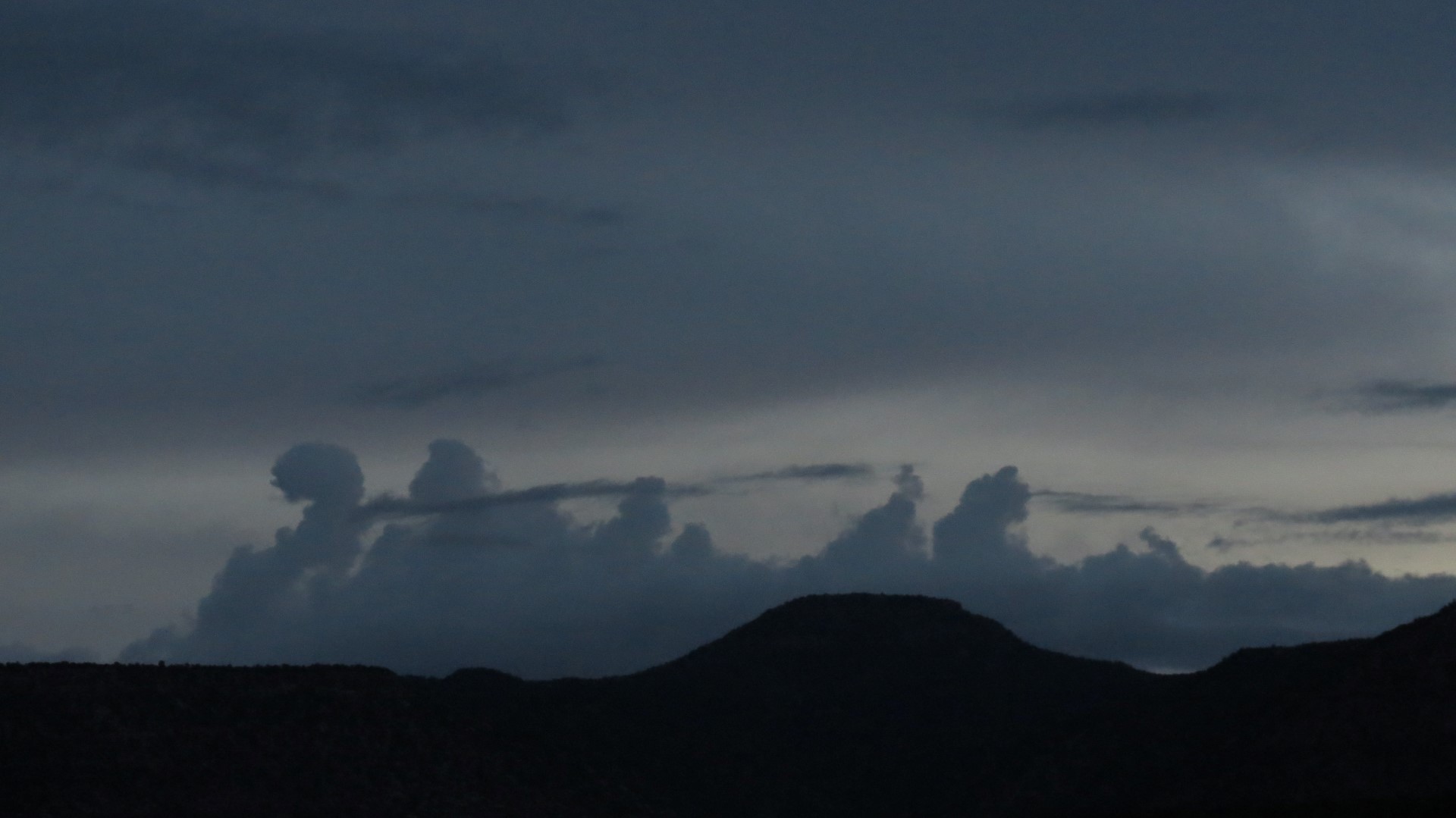 Clouds at Natural Bridges National Monument in Utah  2 of  3 (#0292)